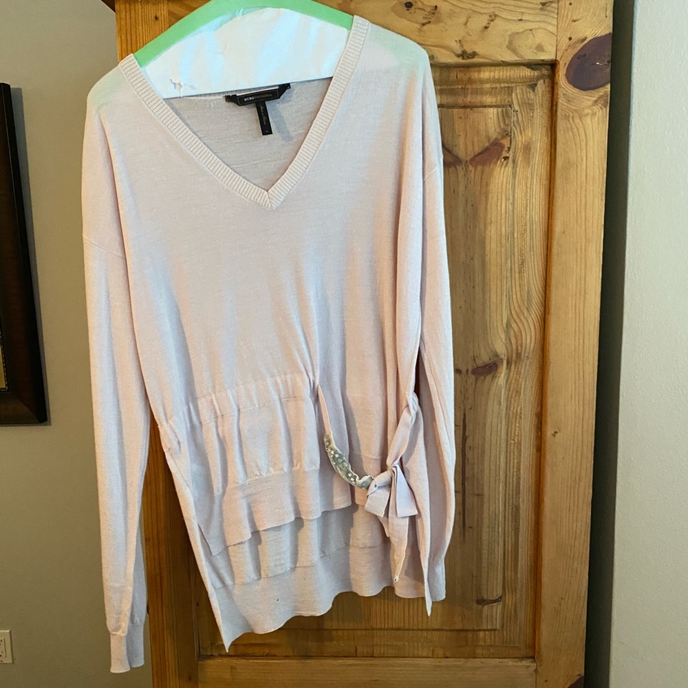Light blush ladies size m sweater detailing at waist- high/low cut